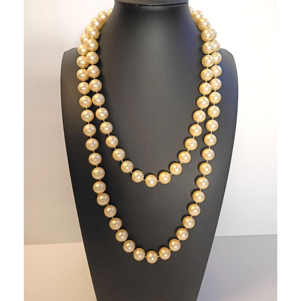 Elegant Vintage Style Rope Necklace features Warm, Cream Colored Faux Pearls